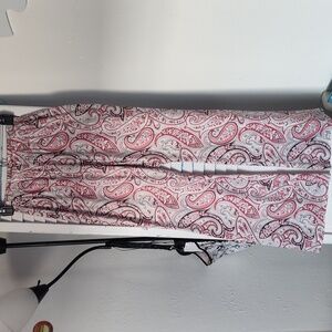 Pink and black Paisley stretch pants with flare leg.